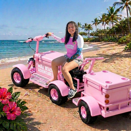 Pink Lahaina Strong tee worn on a Maui beach with a Koolkartz cart